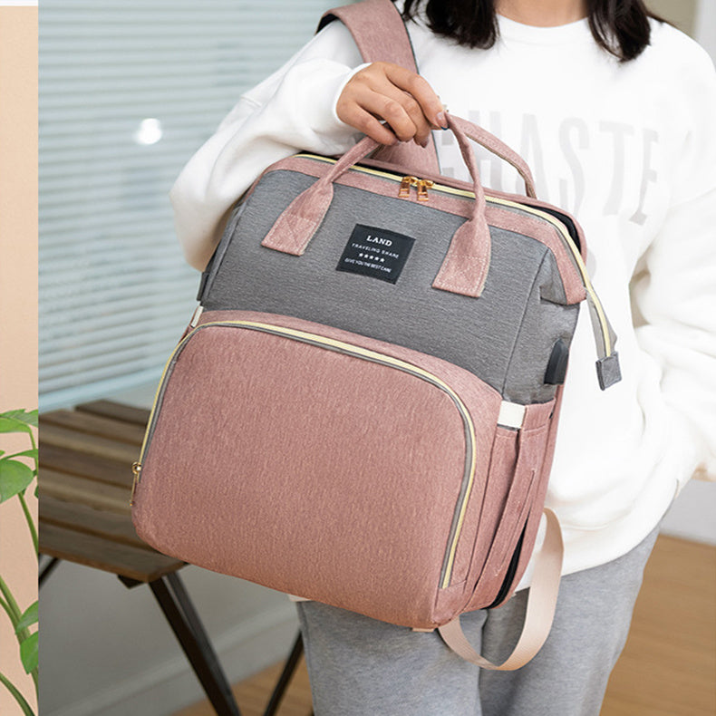 Sac à dos isotherme grande capacité pour bébé et pour faciliter la vie de maman avec son berceau intégrée
