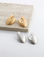 Boucles d’oreilles abstraites minimalistes