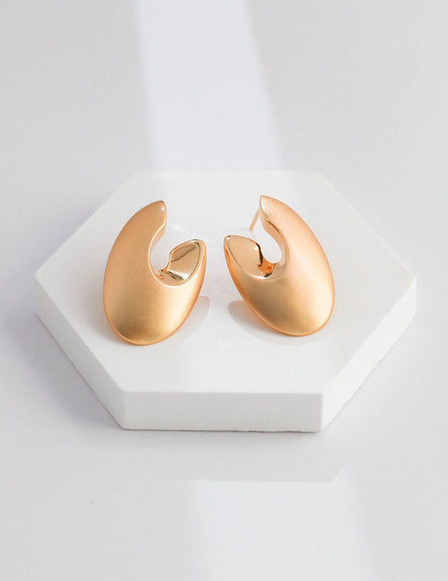 Boucles d’oreilles abstraites minimalistes