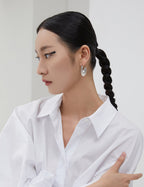 Boucles d’oreilles abstraites minimalistes